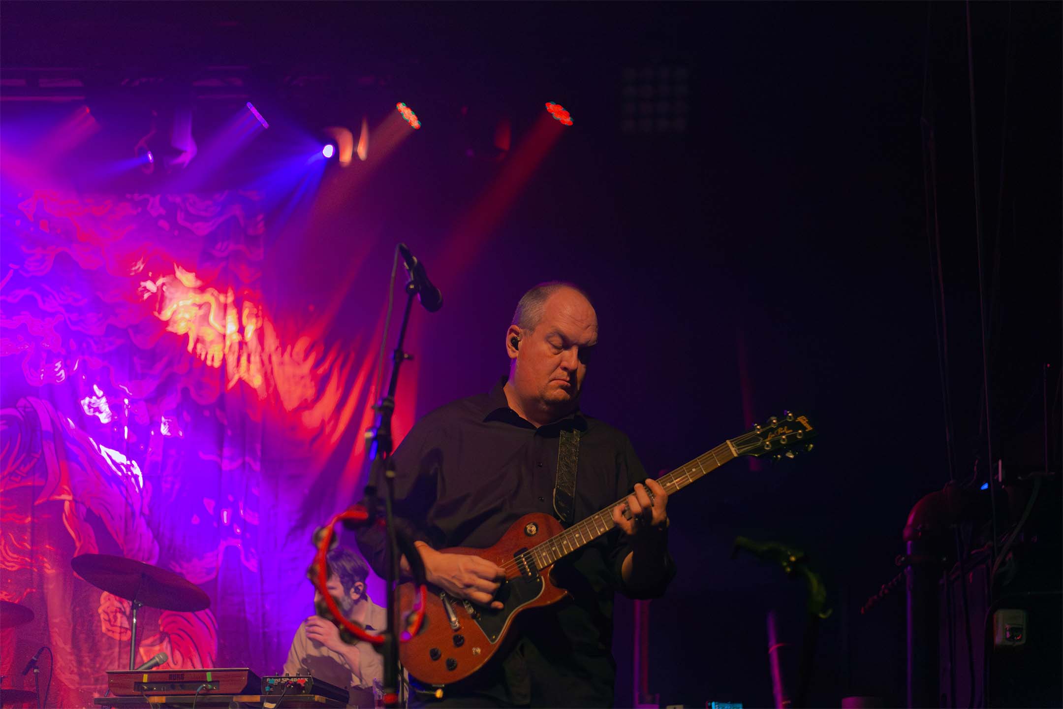 Cursive — guitarist red purple