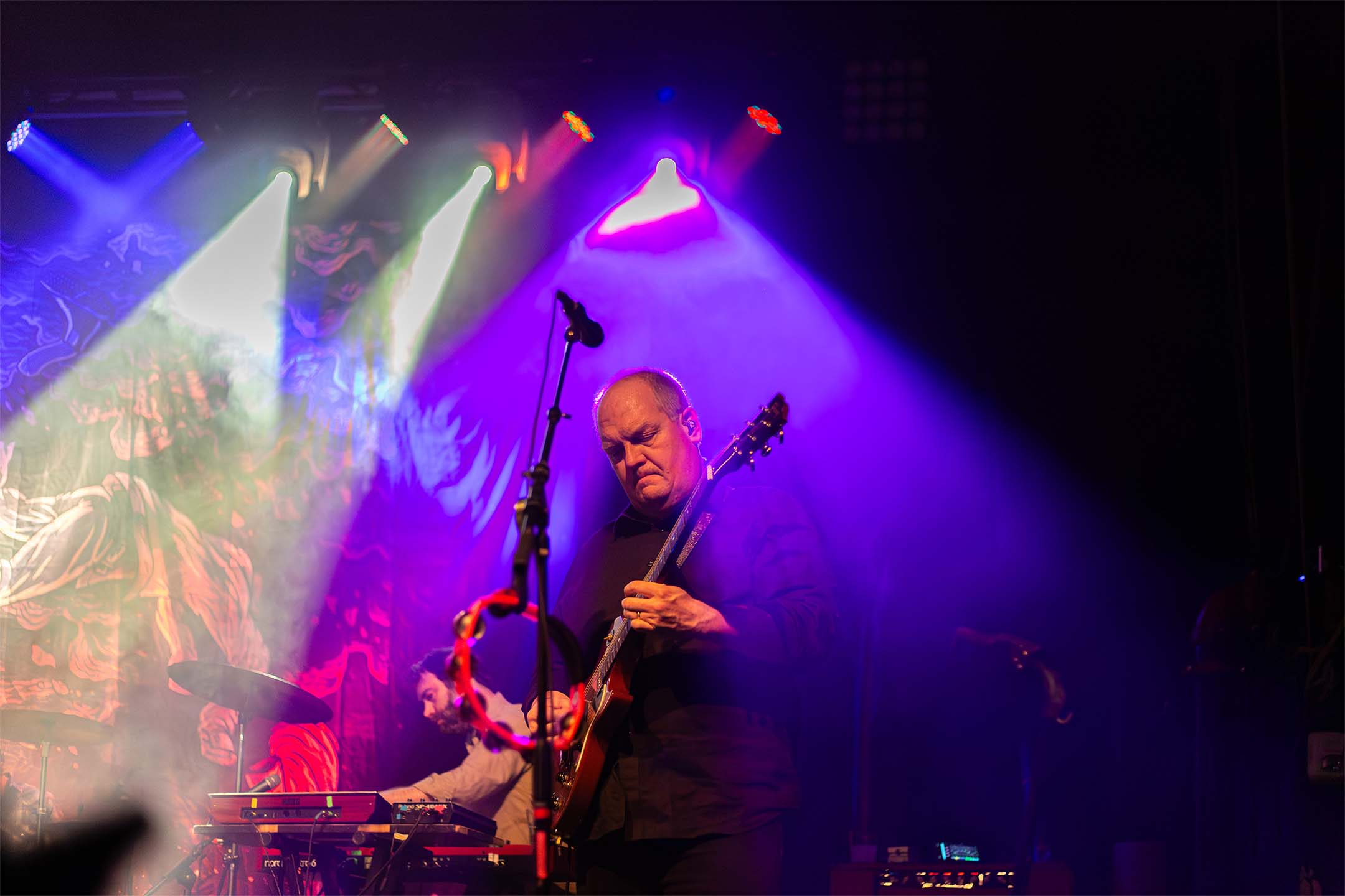 Cursive — crowd silhouette stage