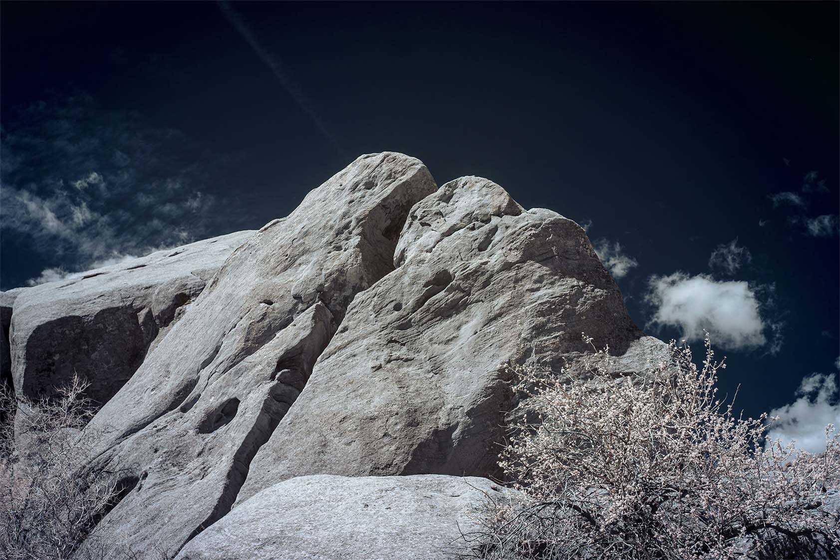 Moonside — white boulders dark navy sky Colorado Springs