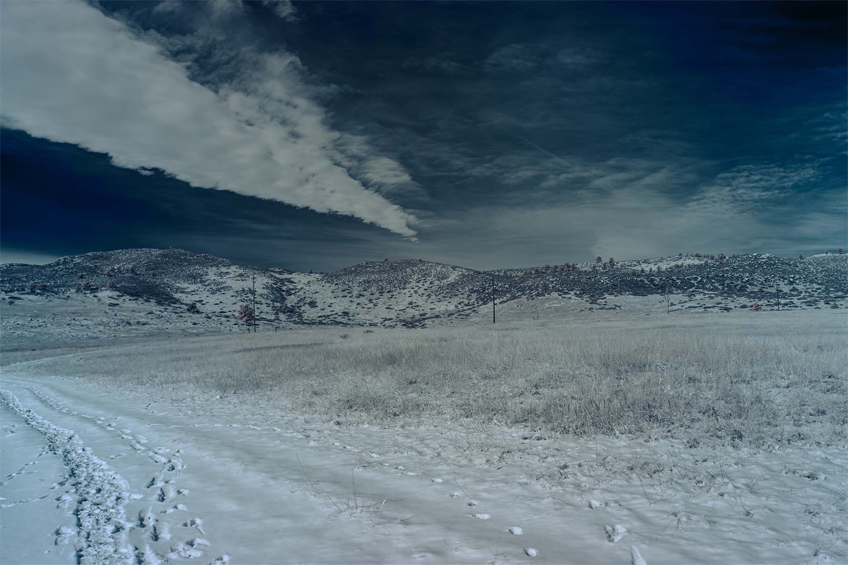 Moonside — snow bridge footprints mountain Colorado infrared