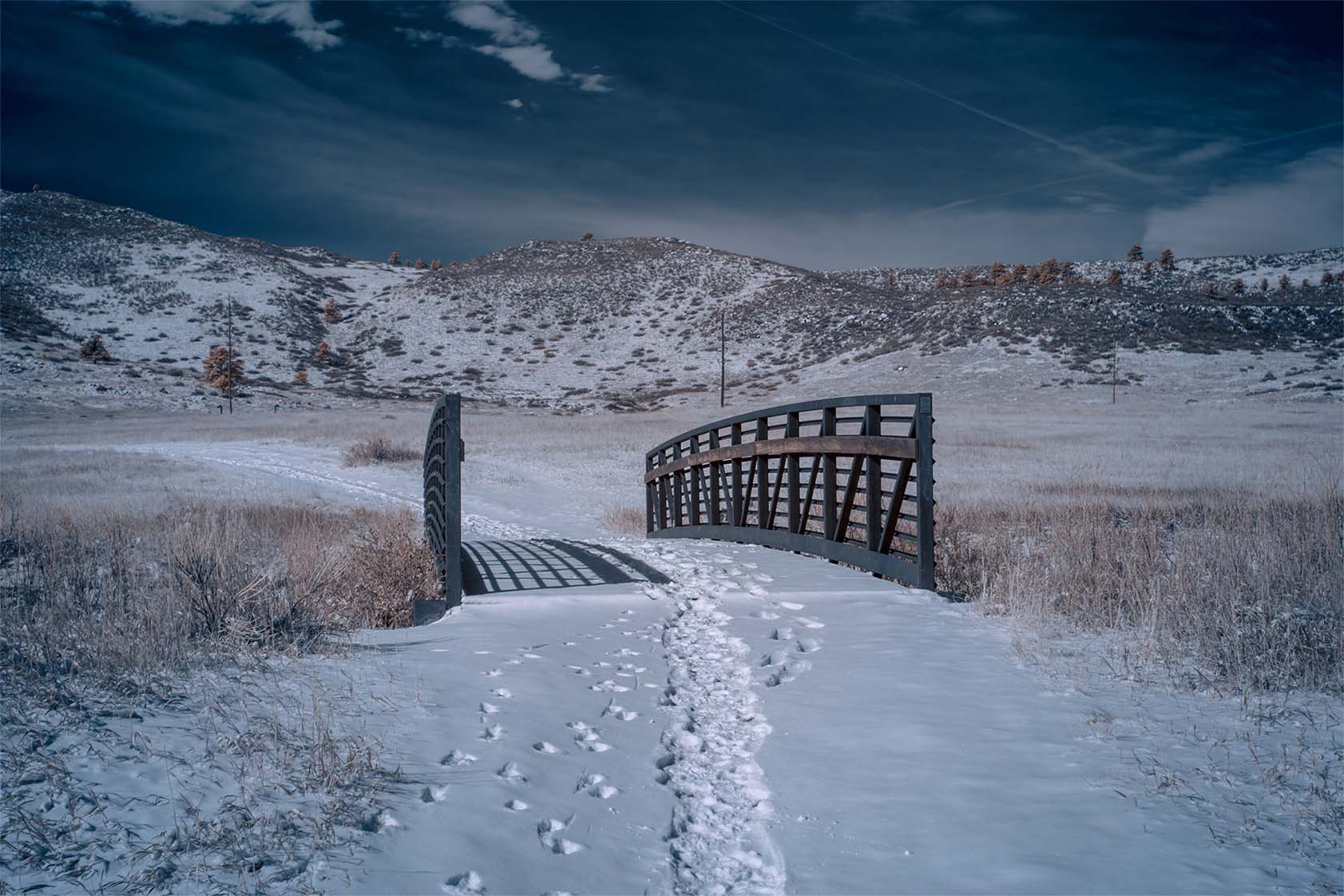 Moonside — Colorado snowy plain dark dramatic clouds