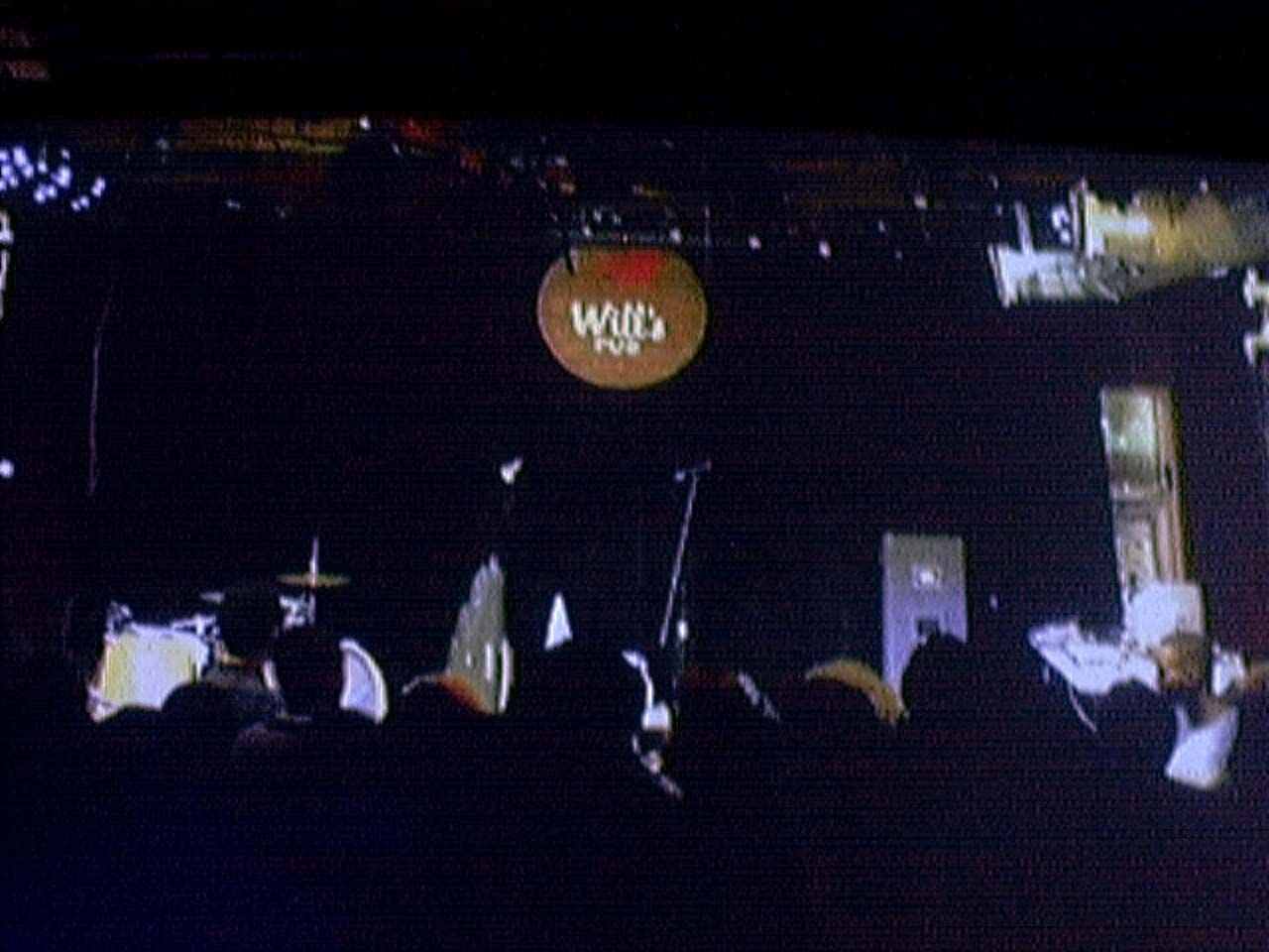 QuadraCam — city beneath cloud shelf mountain