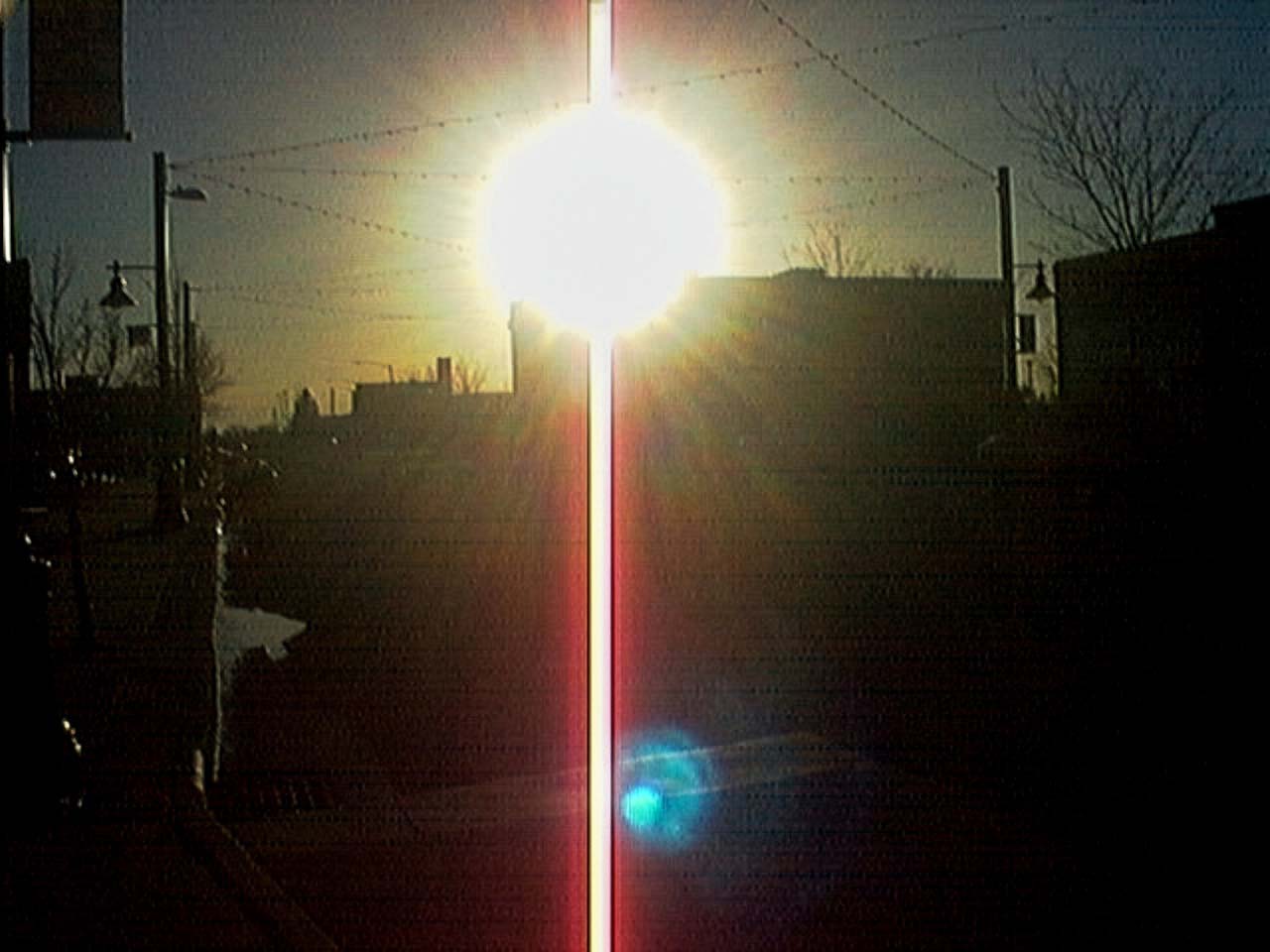 QuadraCam — sensor blown sun red chromatic streak urban