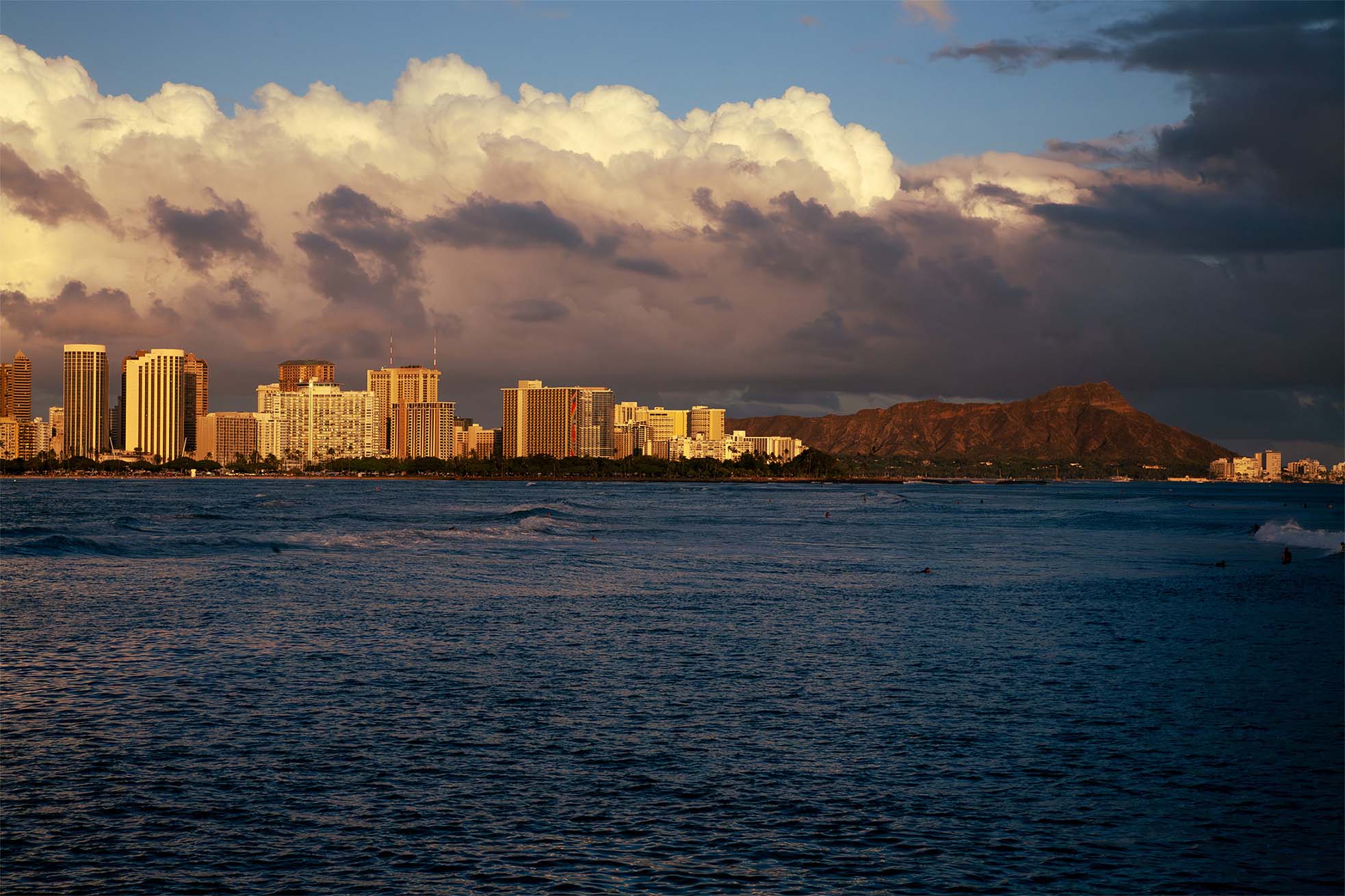 Summers — Hawaii highway traffic palms mountains